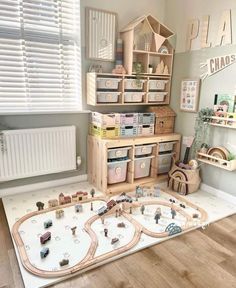 a child's play room with toys on the floor