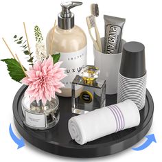 an assortment of personal care items displayed on a black tray with arrows pointing to it