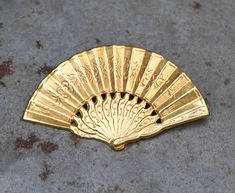 This charming hand fan lapel pin is in fantastic vintage condition, bright as ever, roughly 47mm at its widest and 32mm tall, of gold tone pressed tin and so quite light and comfortable to wear. For more vintage brooches and pins: https://www.etsy.com/shop/Meanglean?ref=seller-platform-mcnav&search_query=pin Back to shop: https://www.etsy.com/uk/shop/Meanglean?ref=si_shop Pressed Tin, Collar Pin, Collar Pins, Pin Art, Gold Hand, Gold Hands, 80s Vintage, Pin Backs, Vintage Jewellery