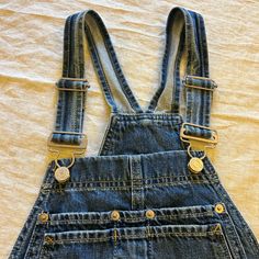 Never Warn. Adorable Year Round Gap Dark Wash Jeans With Pockets, Gap Dark Wash Jeans, Gap Washed Denim Bottoms, Blue Denim Overalls With Button Closure, Gap Washed Denim Jeans, Gap Denim Blue Jeans With Pockets, Gap Denim Blue Jeans, Gap Medium Wash Jeans With Pockets, Gap Medium Wash Jeans