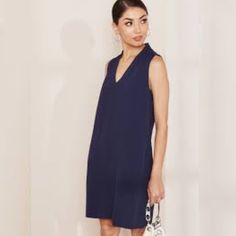 J. Crew 365 Blake V-Neck Shift Dress In Navy Nwt Comfortable And Soft Triacetate Fabric V-Neck And Sleeveless Cut Concealed Back Zipper Closure Relaxed Fit Brand New With Tag Fully Lined 100% Triacetate Women’s Size Xs Flat Lay Measurements 16.5” Pit To Pit 35” Shoulder To Hem 050/Nbw V-neck Mini Dress For Work, Flattering V-neck Midi Dress For Work, Casual V-neck Sleeveless Dress For Date Night, Chic Blue Dress With Notched Neckline, Blue Sleeveless V-neck Dress For Work, Casual V-neck Dress With Notched Neckline For Work, Chic V-neck Shift Mini Dress, Blue V-neck Dress For Daywear, Casual Sleeveless V-neck Dress For Work