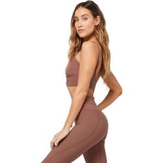 Who says sporty can’t be sassy? With the Soren Top, you can be both. Featuring a cinched front detail with an under bust band, this top is crafted from rib fabric and comes with adjustable straps. Sporty Stretch Ruched Tops, Solid Ruched Activewear For Yoga, Fitted Athleisure Activewear With Ruched Sides, Fitted Ruched Yoga Tops, Athleisure Activewear With Ruched Sides And Stretch, Stretch Athleisure Activewear With Ruched Sides, Casual Ruched Activewear For Yoga, Sporty Ruched Activewear For Workout, Spring Fitted Ruched Activewear