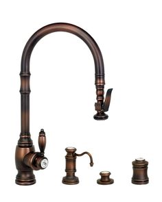 an old fashioned kitchen faucet with copper colored fixtures