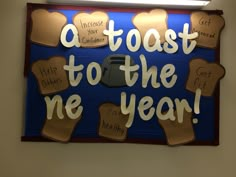 a sign that says, a toast to the new year