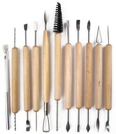 an assortment of kitchen utensils lined up on a white background with one being used as a brush and the other is made out of wood