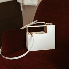 Buy White Square Vegan Leather Handbags Metal Handle Oragan Bags Worldwide Free shipping and return, color: White , material: PU Elegant White Satchel For Party, Modern White Handheld Bag, Trendy White Handheld Box Bag, White Crossbody Evening Bag For Shopping, White Box Bag With Detachable Handle For Party, White Square Box Bag For Party, White Handheld Box Bag With Detachable Handle, White Top Handle Box Bag For Party, Chic White Handheld Bag