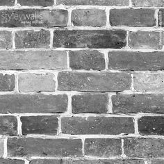 a black and white photo of a brick wall that has been made into a pattern