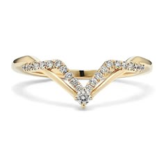 a yellow gold ring with diamonds on it