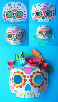 paper mache sugar skull mask with flowers and feathers on the top, in different positions