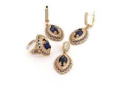 WELCOME TO SUSANJEWELYGIFTS *This stunning navy blue sapphire jewelry set is a perfect gift for women who love elegant and authentic accessories. The set includes a pendant, earrings, and a ring, all made of high-quality silver and bronze. The marquise cut sapphire stones sparkle with a deep blue hue, reminiscent of the Turkish night sky. The design is inspired by the Ottoman style, with intricate details and craftsmanship. This jewelry set is handmade in Turkey, and comes in a beautiful gift bo Marquise Sapphire Jewelry For Formal Occasions, Blue Marquise Cut Sapphire Jewelry, Luxury Sapphire Jewelry Marquise Cut, Luxury Marquise Cut Sapphire Jewelry, Luxury Marquise Sapphire Jewelry, Blue Sapphire Jewelry Set, Sapphire Jewelry Set, Style Ottoman, Sapphire Jewellery