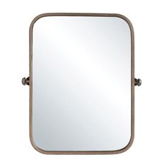 a large square mirror with metal frame