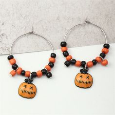 These adorable and spooky pumpkin earrings bring a lovably ghoulish touch to your outfit whether you're dressing for Halloween or any time of year. 1.26" W x 2" L Silver-plated / howlite / acrylic Fun Orange Halloween Earrings, Fun Orange Earrings For Halloween, Spooky Nickel-free Earrings For Halloween, Fun Orange Halloween Jewelry, Fun Orange Jewelry For Halloween, Novelty Orange Earrings For Halloween, Fun Nickel-free Jewelry For Halloween, Earrings Cool, Cheap Earrings