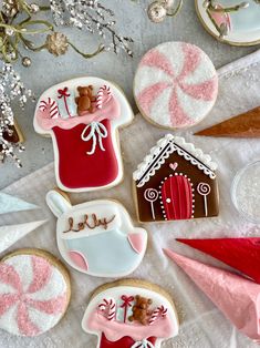 decorated cookies and candies on a table