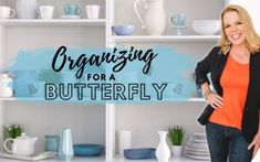 a woman standing in front of a white shelf filled with dishes and vases that says organizing for a butterfly