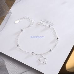 Product description 925 Sterling Silver Adjustable Stars Chain Bracelet Women Girls Charms Design -These Bracelet are Factory made from Genuine .925 Sterling Silver, -Guaranteed Genuine .925 Sterling Silver, Not Filled, Hollow, or Plated. -The Quality of these Bracelet are Excellent and Made to Last. Catch this beautiful accessories for you. Match with suitable apparel for different occasion. Wonderful gift for you and your friends. Special design and unique structure, a popular item. 100% Brand new and high quality High quantity!Factory price! Material: 925 Silver Color: Silver Size:16cm+3cm Chain width:1.3mm   Star width: 9.3mm high: 11mm   Package includes: 1 PCS Fashion Bracelet (Offered in a simple gift bag.) Manual measurement, please allow 1 ~ 3mm error Pictures Handling & Shipping Cheap Silver Bracelets With Star Charm, Elegant Sterling Silver Bracelets With Star Charm, Silver Adjustable Chain Bracelet With Star Charm, Elegant Adjustable Star-shaped Chain Bracelet, Silver Star-shaped Bracelet With Adjustable Chain, Girls Unique, Star Chain, Simple Gifts, Accessories Bracelets