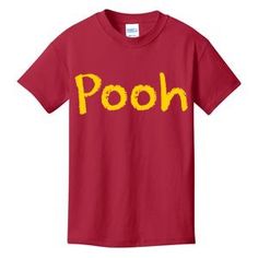 a red t - shirt with the word pooh printed in yellow letters on it