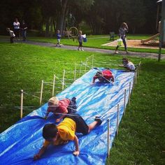 children are playing on an inflatable trampoline