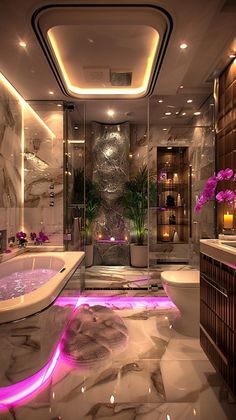 a fancy bathroom with marble flooring and purple lights on the ceiling, along with a large bathtub