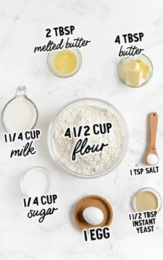 ingredients to make an all - purpose flour recipe laid out on a marble counter top