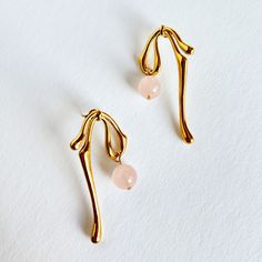 You'll stun in these unique bow drop earrings with a bead charm. Made from 18K gold plated stainless steel, they're perfect for any occasion - even the beach! Choose faux pearl, rose quartz, or red. Drop length approximately 2" Gold Rose Quartz Earrings For Gift, Unique Bows, Precious Gemstones Jewelry, Pearl Rose, Dalmatian Jasper, Dalmatian, Be My Valentine, Semi Precious Gemstones, Bead Charms