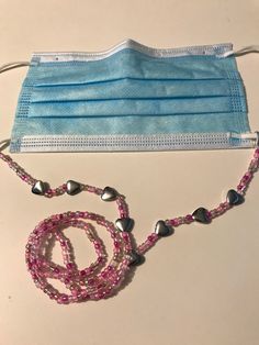 Excited to share the latest addition to my #etsy shop: Silver hearts and pink beads colored beads mask holder, Mask holder chains, 28 inches look towards love Mask Lanyard Beaded, Beaded Mask Lanyard, Face Mask Holder, Pink Flip Flops, Lanyard Necklace, Mask Holder, Necklace Holder, Sunglass Holder, Eyeglass Holder