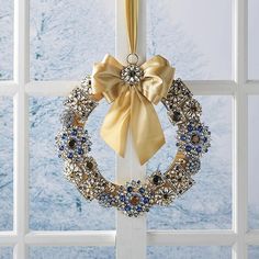 a wreath hanging on the side of a window