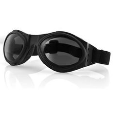 The Bobster Bugeye Goggle Black Frame Smoked Lens includes open cell sweat absorbing foam around the frame for ultimate protection. A vented, flexible plastic frame encloses polycarbonate lenses. It is low profile enough to fit under a helmet. Size: OS. Black Shock Resistant Protective Gear For Outdoor, Shock Resistant Black Protective Gear, Black Shock Resistant Protective Gear, Black Protective Gear With Shock Resistance, Functional Black Shock Resistant Protective Gear, Durable Black Polycarbonate Sunglasses, Black Anti-reflective Protective Sunglasses, Black Protective Sunglasses With Tinted Lenses, Black Protective Tinted Sunglasses