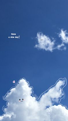 there are clouds in the shape of a unicorn and an airplane flying overhead with words above it