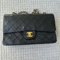 100% Authentic Vintage Chanel Flap. Please Dm For More Info On The Bag If Interested. Normal Used And Vintage Condition. Leather Is Super Soft And Is Made Of Lamb Skin. Please Check My Past Listings For References. Vintage Classic Flap Chanel, Chanel Bag Classic, Vintage Chanel Double Flap, Classic Black Chanel Bag, Rare Chanel Bag, Chanel Vintage Single Flap Bag, Vintage Chanel Bag, My Past, Chanel Vintage