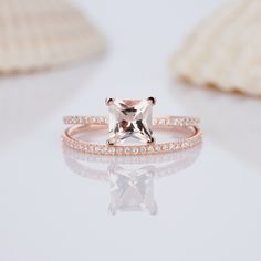 an engagement ring with a princess cut diamond