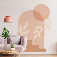 a living room with a couch, coffee table and potted plant in front of the wall