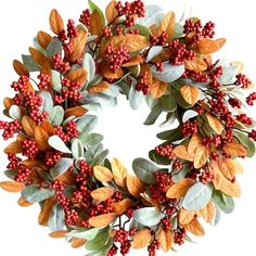 a wreath with red berries and green leaves