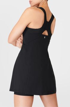 This sporty dress features sweat-wicking Power Pro fabric so you perform at your best, while the built-in shorts with drop-in pockets keep you feeling secure. 32" length; 4" inseam; 18" leg opening (size Medium) Scoop neck Racerback Built-in bra with removable cups Interior brief with side drop-in pockets 62% polyamide, 38% elastane Lined Machine wash, dry flat Imported Athleisure Racerback Tennis Dress For Workout, Racerback Tennis Dress For Workout, Functional Stretch Tennis Dress For Workout, Functional Sleeveless Tennis Dress For Workout, Fitted Gym Dress In Athleisure Style, Sporty Racerback Dresses, Fitted Athleisure Dresses For Gym, Fitted Athleisure Dresses For The Gym, Moisture-wicking Dresses For Sports