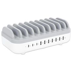 a white and gray power strip with six outlets on each side, attached to the wall