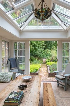 the sun room is filled with lots of natural light