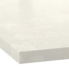 a close up view of the top of a white marble countertop with no one on it