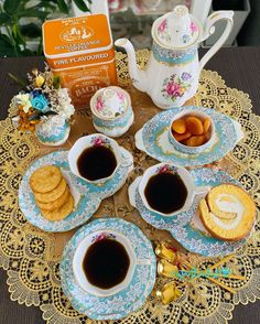 tea and cookies on a doily with an orange box in the background