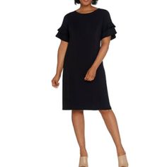 New In Online Package Bob Mackie Regular Knit Dress Black Only A310827 Fabrication: Knit Features: Short Ruffle Sleeves, Round Neckline, Princess Seaming, Center Back Seam Fit: Semi-Fitted At The Bust And Waist, Follows The Lines Of The Body With Added Wearing Ease; Flares To A Full Bottom Opening; Relaxed Sleeves Length 37.5" - 37.75" Armpit To Armpit Xxs 17.5" Xs 18.5" Content: 89% Polyester/11% Spandex Care: Machine Wash, Line Dry Dress Black Fitted Midi Dress With Ruffle Sleeves, Black Career Dresses For Spring, Ruffle Sleeve Stretch Dresses For Work, Stretch Ruffle Sleeve Dresses For Work, Black Career Dress With Short Sleeves, Black Short Sleeve Career Dress, Black Ruffled Sheath Dress, Black Sheath Dress For Career, Black Ruffle Sleeve Formal Dress