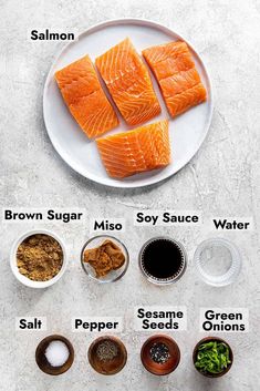 the ingredients for salmon on a white plate