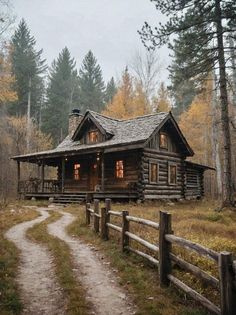 a log cabin in the woods with a path leading to it