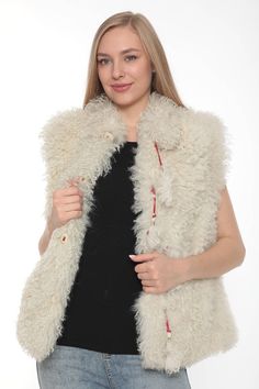 This is unique natural shearling waistcoat.  Length is 25 inches.  Size is S ( US 4 ), S ( US 6 ). Made with Mongolian shearling.  İnterior lining is sateen fabric.  There is closure button.  There is two pocket on it.  On interior lining there is little pen mark. I showed on photos.  Very chic and soft.  We have door to door express shipping.  İf you have any questions please feel free to aske.  bemyboots.etsy.com Thank You Boho Style Boots, Vintage Waistcoat, Embroidery Boots, Fur Waistcoat, Mother Days, Handmade Vest, Boho Mode, Lamb Leather Jacket, Fur Leather Jacket