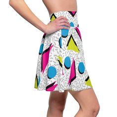 Featuring a cool retro Memphis geometric pattern like the ones popular in the 80s and 90s. A versatile fit skater skirt with a cozy, soft touch and a casual look. Inspired by the freedom of creativity, it will instantly become your everyday favorite. .: 95% Polyester 5% Spandex .: Versatile fit .: Printed on care label in black color .: White thread color Retro Summer Skirt, Retro Flared Mini Skirt For Summer, Retro Summer Pencil Skirt, Retro Relaxed Flared Mini Skirt, Retro Graphic Print Skirt For Spring, Retro White Mini Skirt, White Retro Mini Skirt, 80’s Skirt, Retro Summer Skirt With Graphic Print