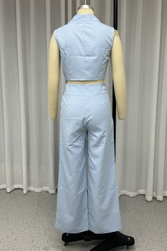 Details: Material: Polyester Style: Casual, Daily Pattern Type: Solid Color Element: Buttons, Irregular Neckline: Turn-back Collar Sleeve Length: Sleeveless Suit Type: Two-pieces Waist Type: High Waist Clothing Length: Short Profile: Wide Leg Type: Solid Color Size(in) Bust Waist Hips S 34.6 26.8 38.6 M 36.2 28.3 40.2 L 37.8 29.9 41.7 XL 39.4 31.5 43.3 Tips:Due to the many variations in monitors, the color in the image could look slightly different, please take physical design and color shall pr Blue Cropped Vest For Spring, Blue Sleeveless Vest For Work, Blue Sleeveless Vest For Workwear, Blue Cropped Vest For Summer, Blue Sleeveless Spring Vest, Blue Sleeveless Tank Top For Work, Light Blue Sleeveless Spring Vest, Suit Type, Sleeveless Suit