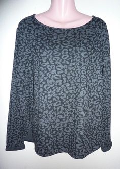 New with tag attached is an H&M top/sweater/sweatshirt in a ladies size XL. Long Sleeve pullover top is soft and casual and may also be considered a dressier, thinner weight sweatshirt. The top has a wider rounded neckline and a slightly rounded hemline. The print is a leopard print done in a darker gray with black. The fabric content is 62% poly, 34% viscose, 4% elastane. Reduced Fee Shipping!  Measurements Please check photos with tape measurements and possibly check measurements to a similar Oversized H&m Sweatshirt For Winter, Oversized H&m Winter Sweatshirt, H&m Oversized Winter Sweatshirt, H&m Relaxed Fit Sweatshirt For Winter, H&m Relaxed Fit Winter Sweatshirt, H&m Oversized Cotton Sweatshirt, H&m Long Sleeve Sweatshirt For Winter, H&m Long Sleeve Winter Sweatshirt, H&m Long Sleeve Graphic Print Sweatshirt