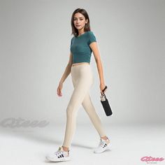 Qteee - Wrinkle-pleated Threaded Waist Sport Top: Elastic Fitness Apparel with Bare Sensation for Sport and Yoga, Short Sleeves Casual Beige Activewear For Workout, Fitted Casual Beige Activewear, Casual Snug Fit Summer Activewear, Casual Summer Snug Fit Activewear, Tight Casual Activewear For Light Exercise, Fitted Beige Gym Top, Casual Tight Activewear For Light Exercise, Beige Stretch Gym Top, Beige Stretch Top For Gym