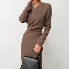 Elevate your autumn and winter fashion with our Women's Long Sleeve Slim Dress. This dress is designed to flatter your figure, with a waist-slimming cut that accentuates your curves. The round neck and mid-length hem create a timeless and elegant look suitable for various occasions. Whether you're dressing up for a special event or a night out, this dress offers comfort and style. Embrace the colder seasons with confidence in our Women's Waist-Slimming Long Sleeve Dress. Luxury Long Sleeve V-neck Dress For Work, Elegant Bodycon Dress Chic Me, Long Sleeve Summer Dress For Night Out, Winter Party Dresses Long, Business Formal Dress Long Sleeve, Work Party Dress Long, Long Sleeve Bodycon Dress Brown, Midi Party Dress Long Sleeve, Elegant Long Sleeve Dress For Night Out