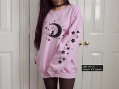 ❗ For UK customers, sizes 3XL to 5XL are only available in White, Black, and Sport Grey colors. We apologize for any inconvenience. ❗ Get 25% OFF your entire first order when you join our mailing list: https://bit.ly/ChonkyCat Check out our Lunar Kitty sweatshirt - with a cute cat playing on the moon! If you are a fan of the pastel goth aesthetic nad cats, this sweatshirt was made for you. This crewneck with front and sleeves print (we also offer front print only option as a more affordable alternative 💲 ) is cozy, perfect for any occasion. Grab this cute aesthetic sweatshirt now for yourself or as a gift to your friends and family! For an oversized look, we recommend you get about 2 sizes above. 🍓 Sweatshirt (front print only) : https://chonkkittea.etsy.com/uk/listing/1656228443/pastel- Cat Clothes For Women, Creepycute Aesthetic Outfits, Pastel Goth Outfits Aesthetic, Plus Size Pastel Goth, Pastel Goth Sweater, Pastel Goth Tumblr, Pastel Goth Aesthetic, Pastel Goth Outfits, Aesthetic Sweatshirt