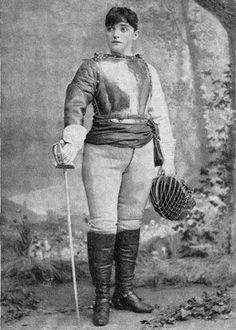 an old black and white photo of a man in period clothing with a cane, holding a basket