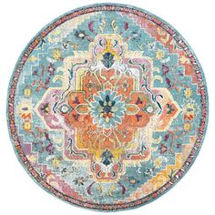 a round rug with an orange, blue and yellow design on it's center