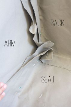 the back side of a woman's shirt with measurements